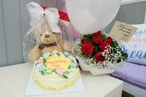 Cake, balloon, teddy, flowers